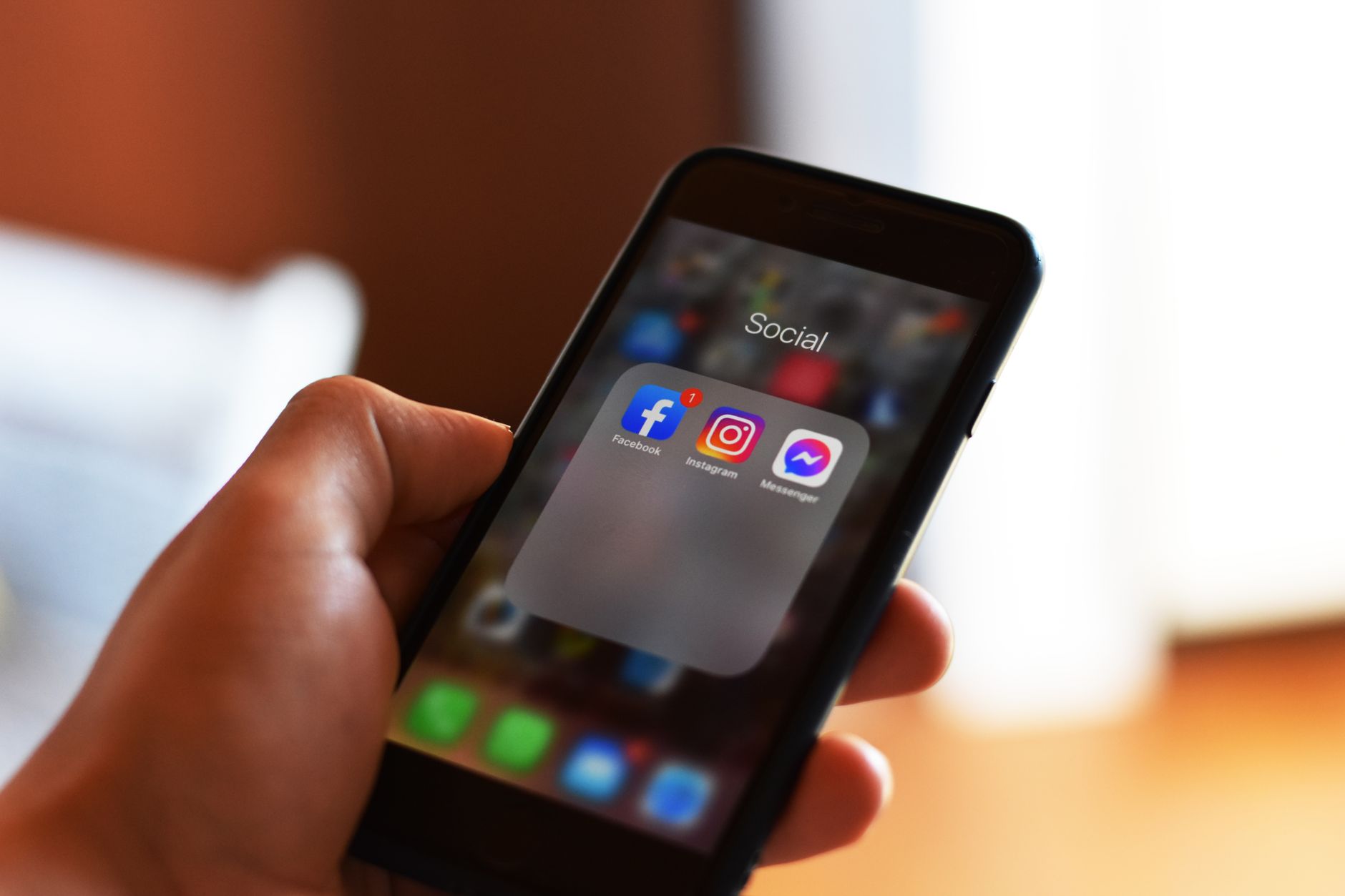 Smartphone showing social media engagement, representing UK librarians social media fame